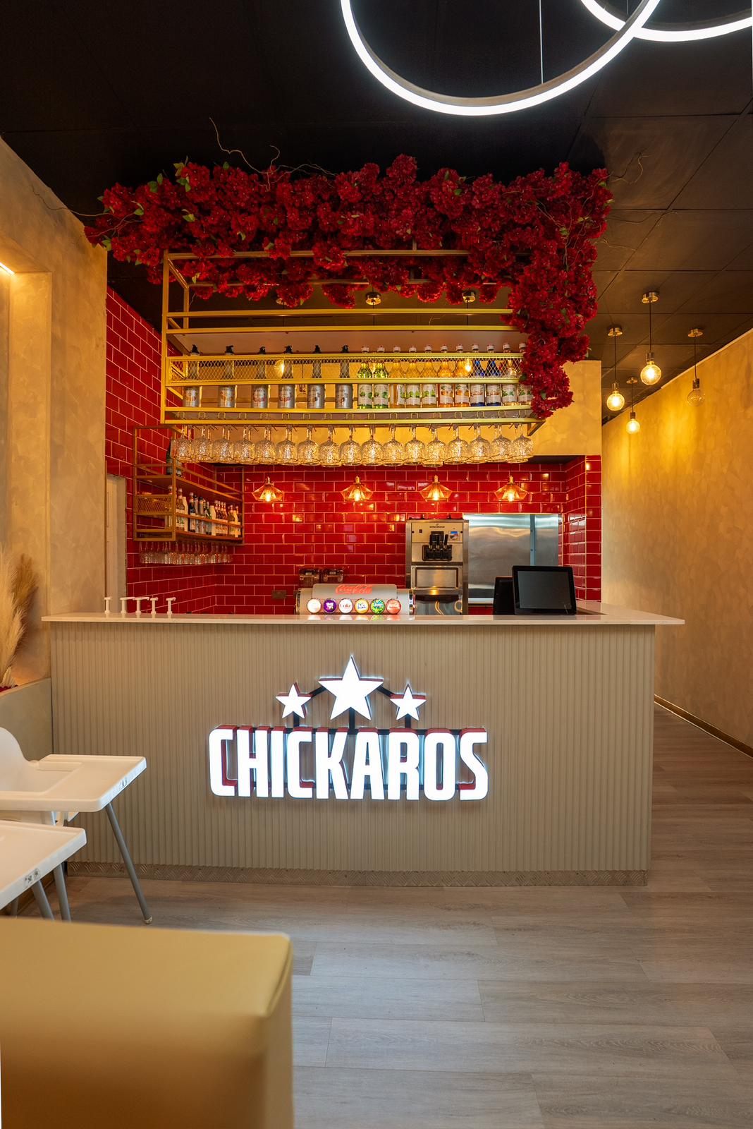 Chickaros service counter with illuminated logo